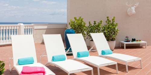 pelican-grand-beach-resort-noble-house-resort-oceanfront-sun-deck